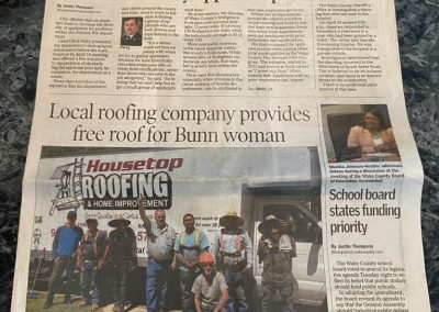 Wake Weekly newspaper with a Housetop Roofing crew photo and story on a free roof for a Bunn resident.